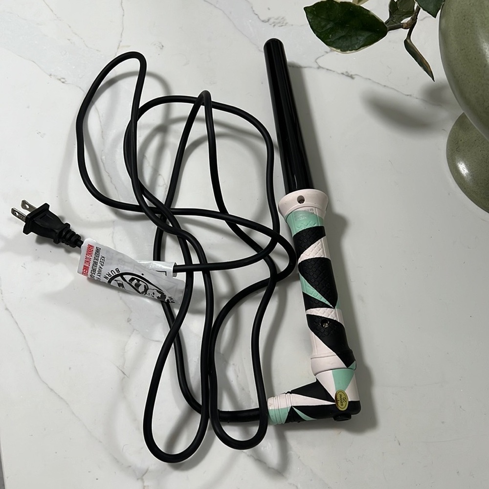 Amika curling wand iron